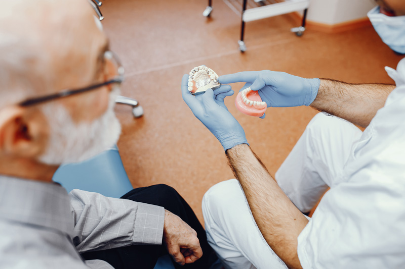 old man sitting in the dentist s office