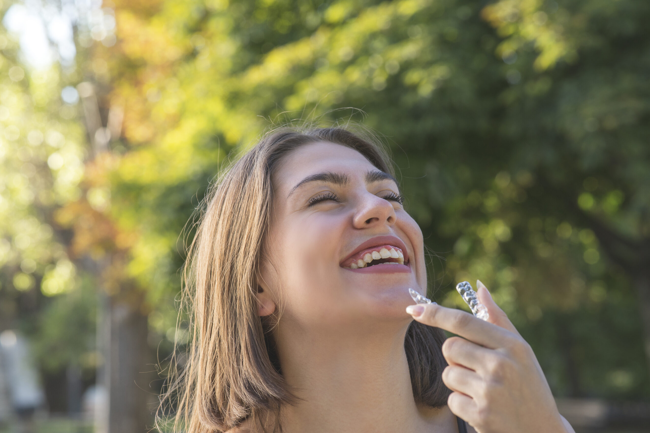 beautiful smiling turkish woman is holding an invi 2023 11 27 04 55 59 utc